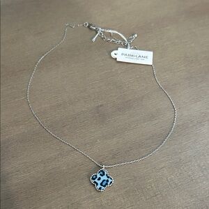 Park Lane Silver Necklace with Blue Leopard-Print Clover Pendant